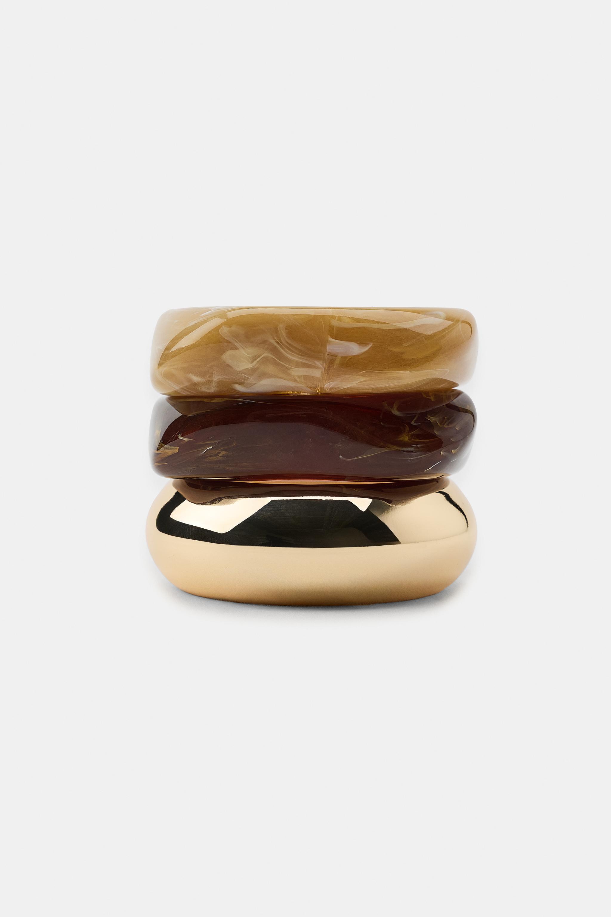 THREE-PACK OF RIGID METAL BRACELETS